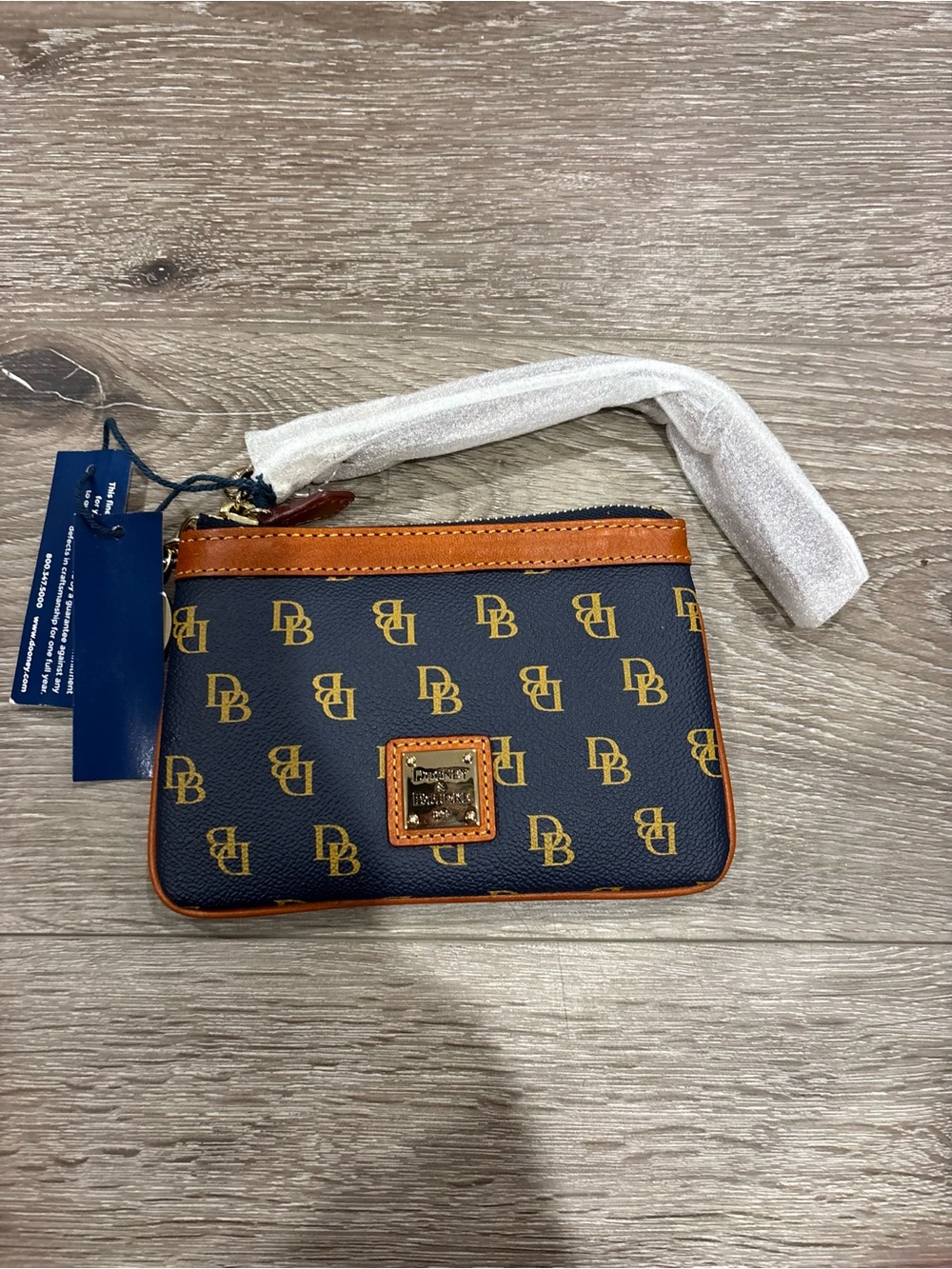 Dooney & Bourke Navy and Tan DB Logo Wristlet